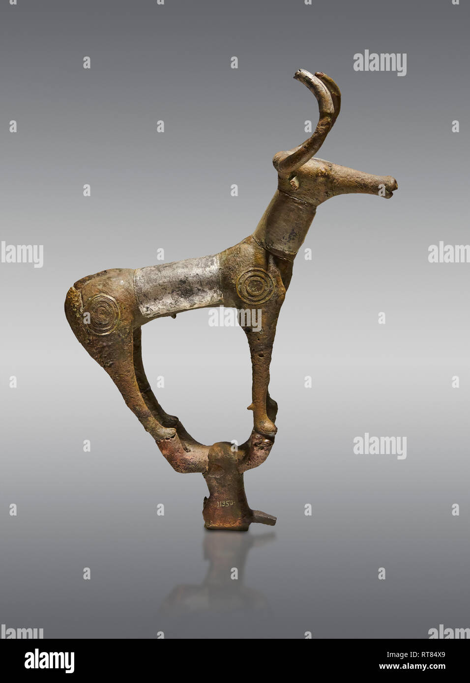 Bronze Age Hattian ceremonial bull statuette in bronze from a possible Bronze Age Royal grave L (2500 BC to 2250 BC) - Alacahoyuk - Museum of Anatolia Stock Photo