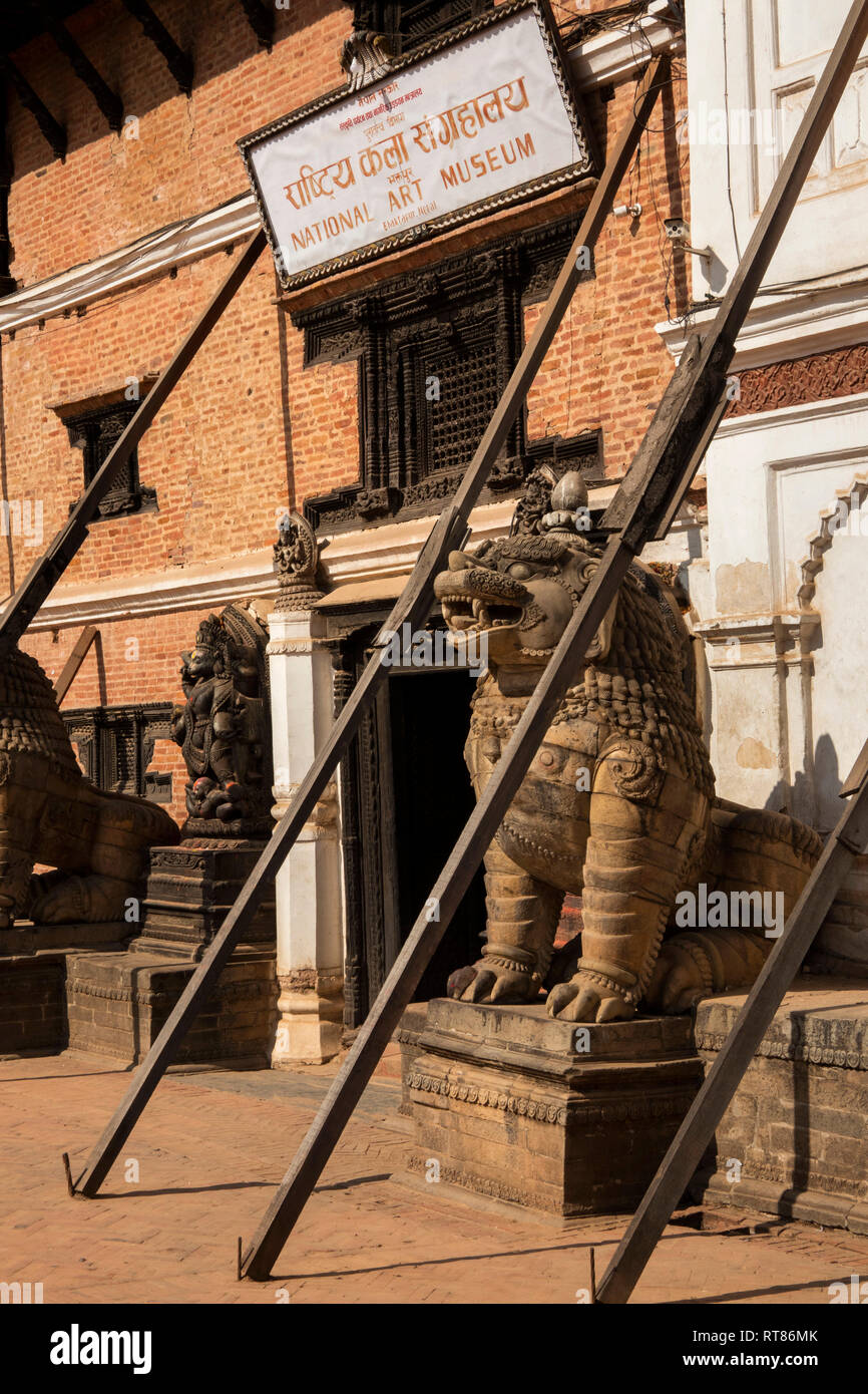 Nepal, Kathmandu Valley, Bhaktapur, Durbar Square, wooden supports bracing earthquake damaged National Art Museum building Stock Photo