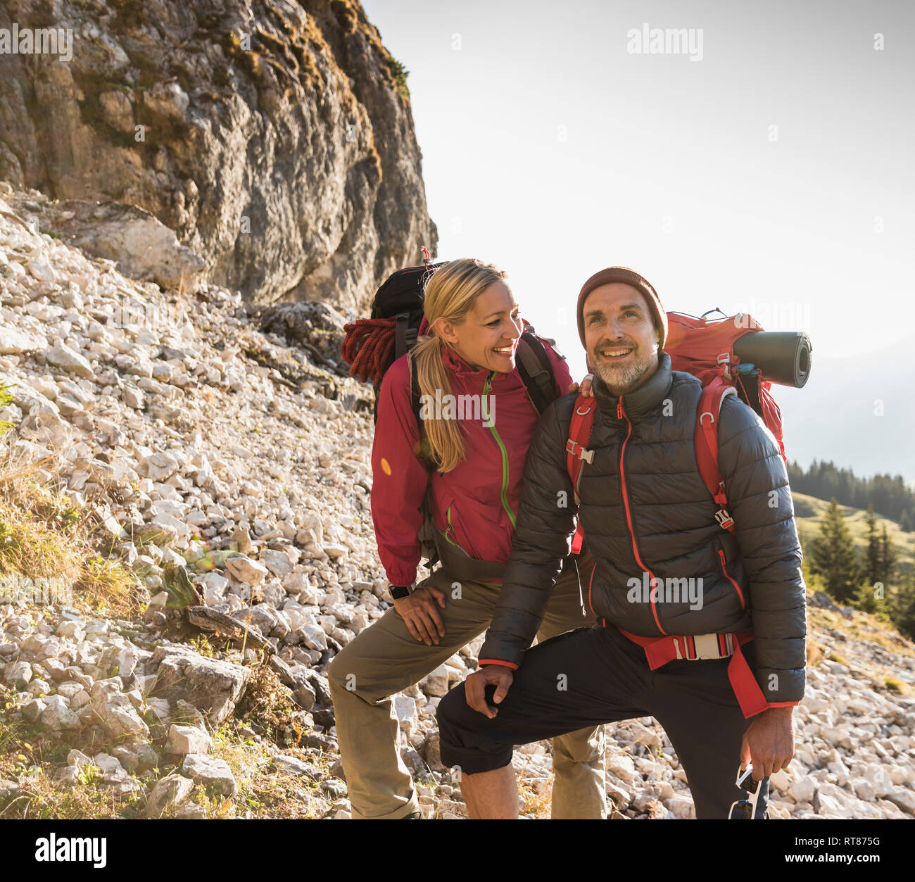 Hiking couple admiring beautiful nature Stock Photo