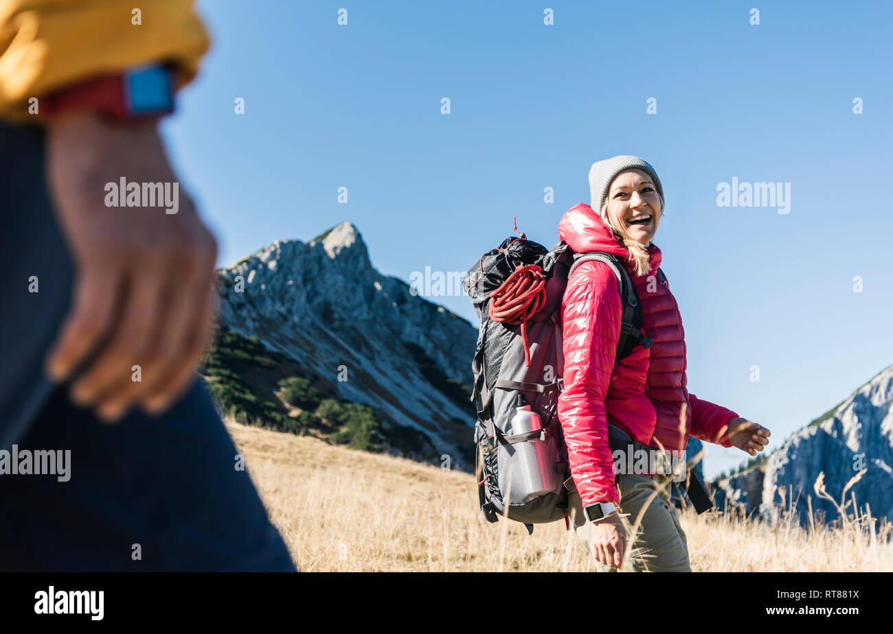 Austria, Tyrol, happy woman with man hiking in the mountains Stock Photo