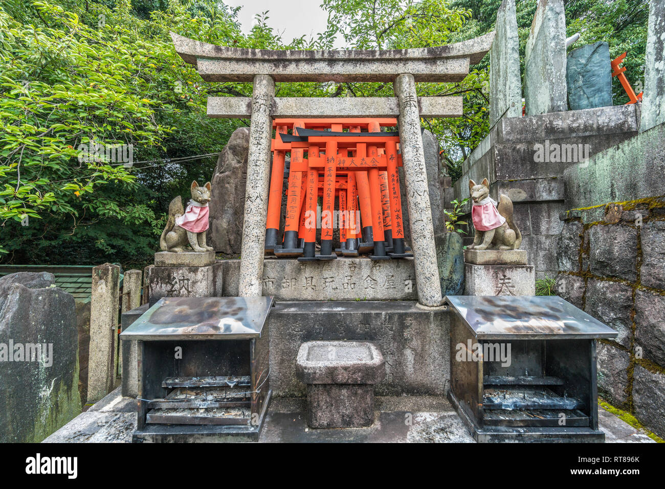 Fushimi-ku, Kyoto, Japan - August 23, 2017 : Kanamori Otsuka (worshiping stones engraved with deities names) at Sannomine (Shimosha Shinseki) area of  Stock Photo