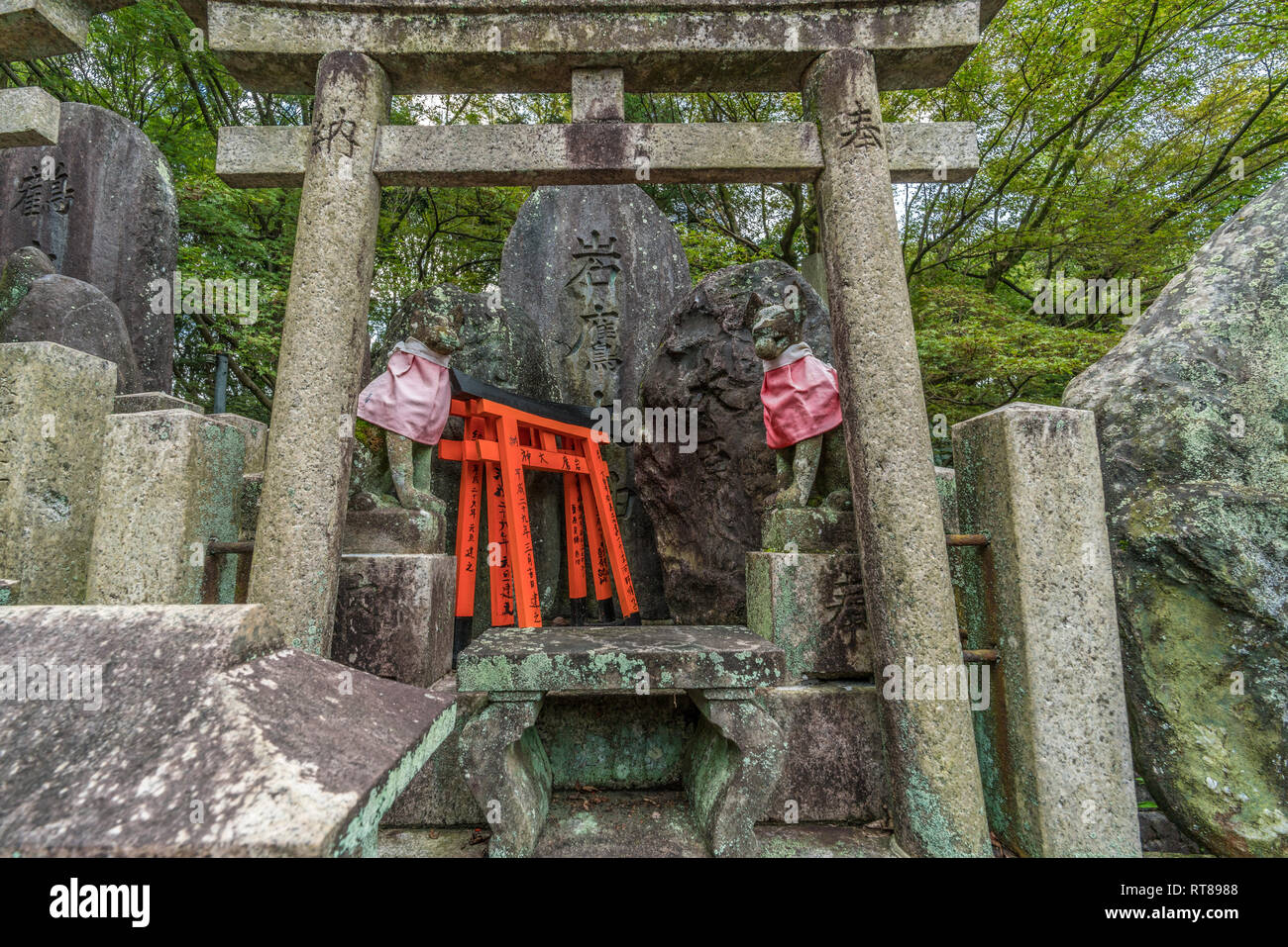 Fushimi-ku, Kyoto, Japan - August 23, 2017 : Iwataka Ogami Otsuka (worshiping stones engraved with deities names) at Sannomine (Shimosha Shinseki) are Stock Photo