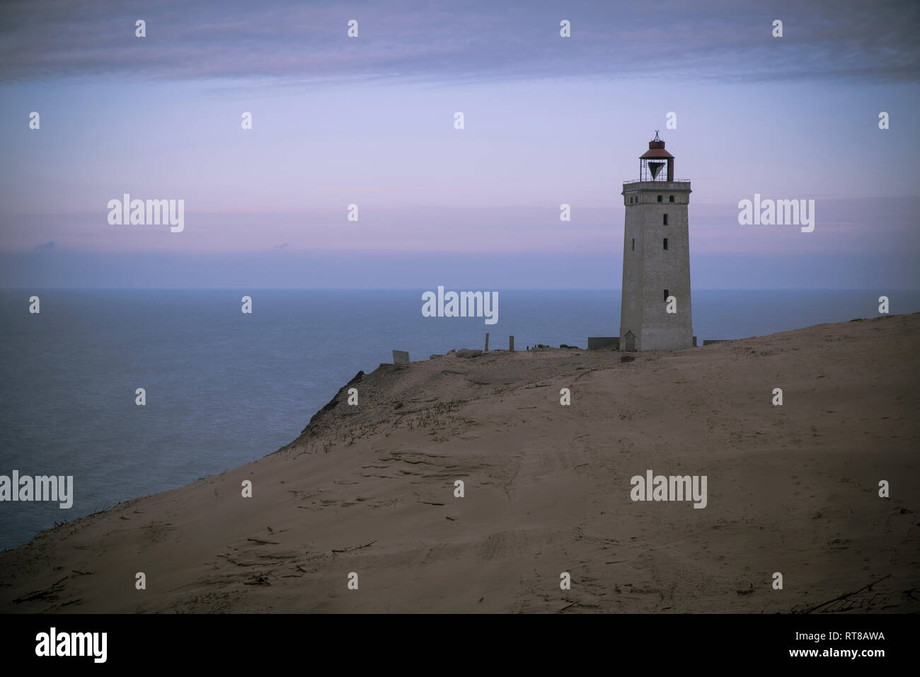Denmark, North Jutland, Rubjerg Knude Lighthouse at blue hour Stock Photo