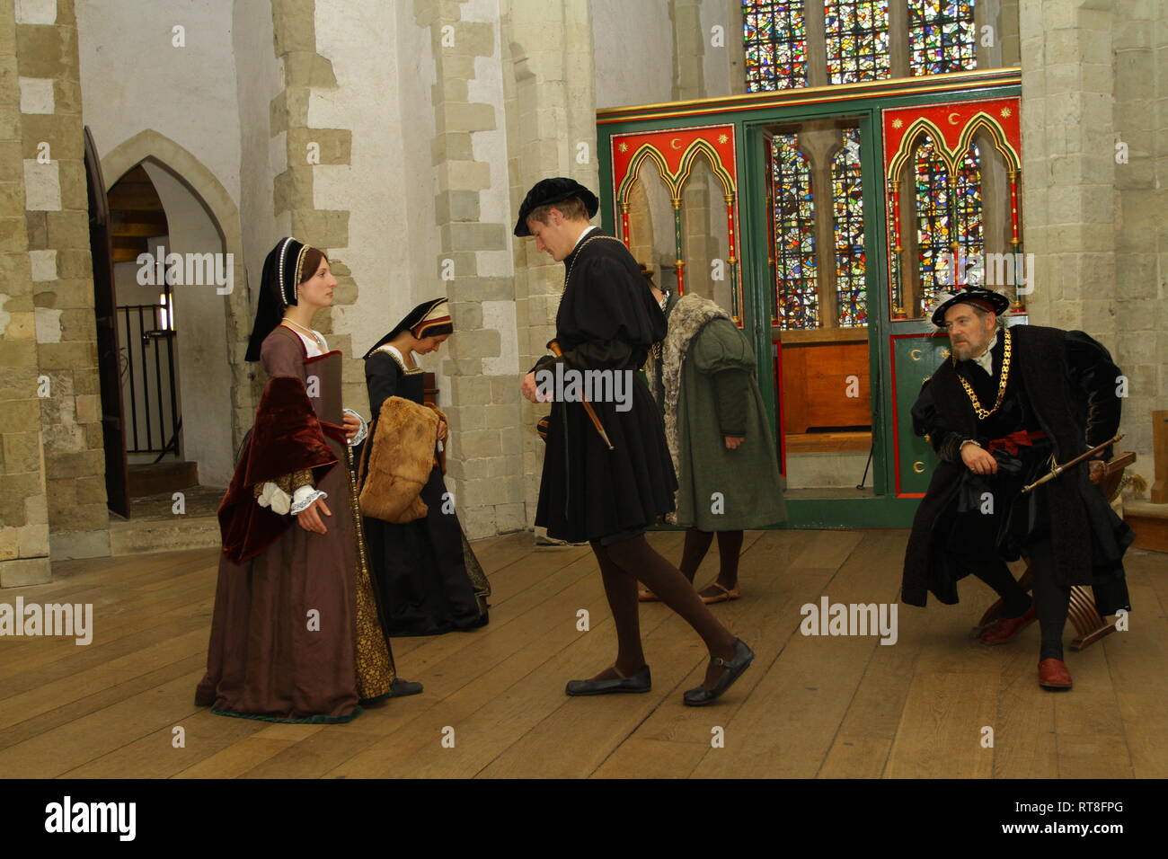Anne Boleyn and Henry VIII are art a dance with courtiers at The Tower of London Stock Photo