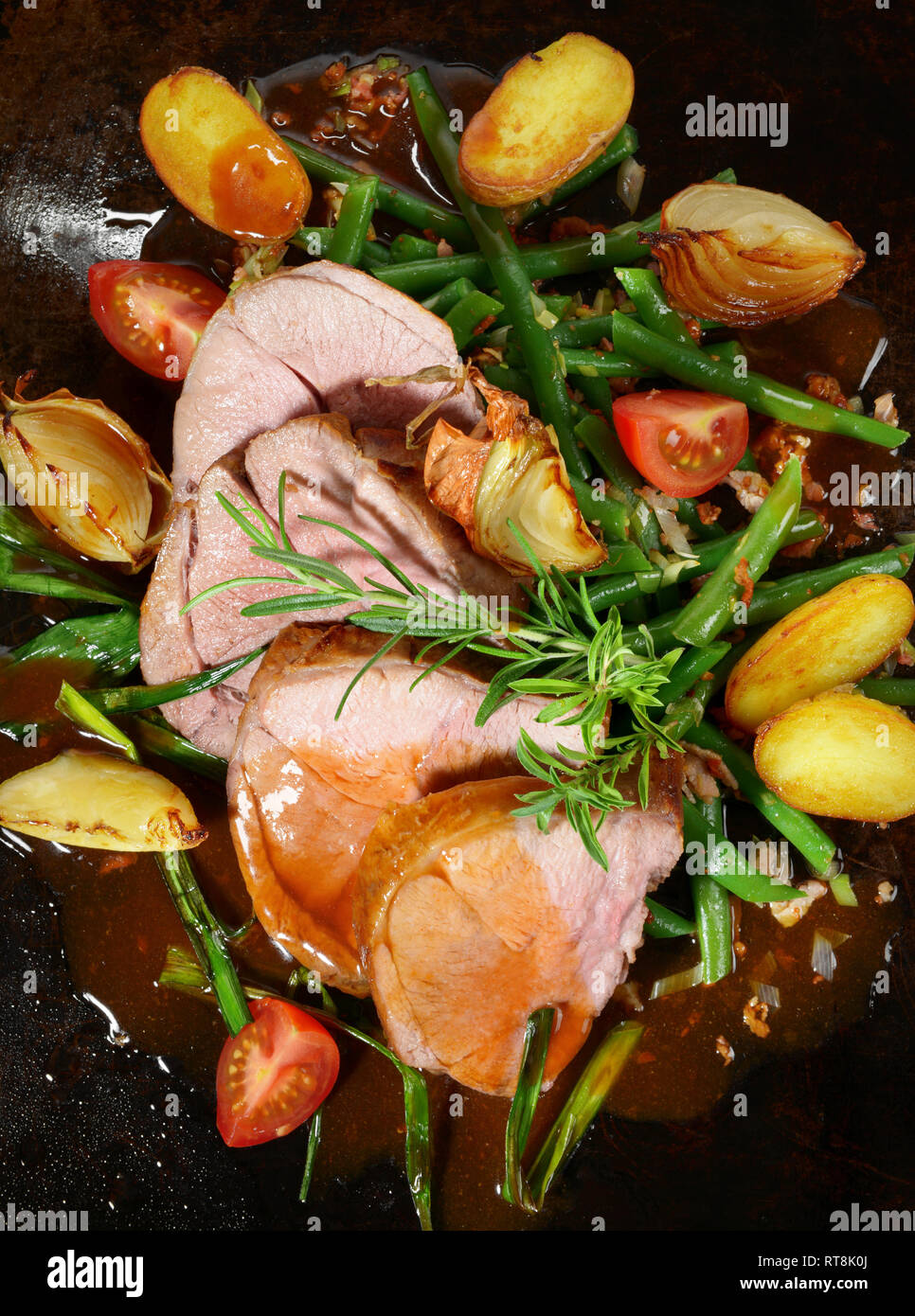 Roasted Lamb on green Beans Black Background Stock Photo Alamy