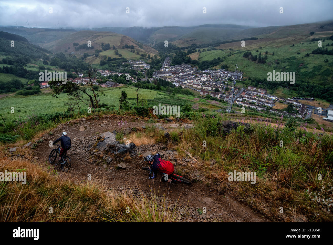 Two men ride mountain bikes on a trail at Glyncorrwg in Neath Port