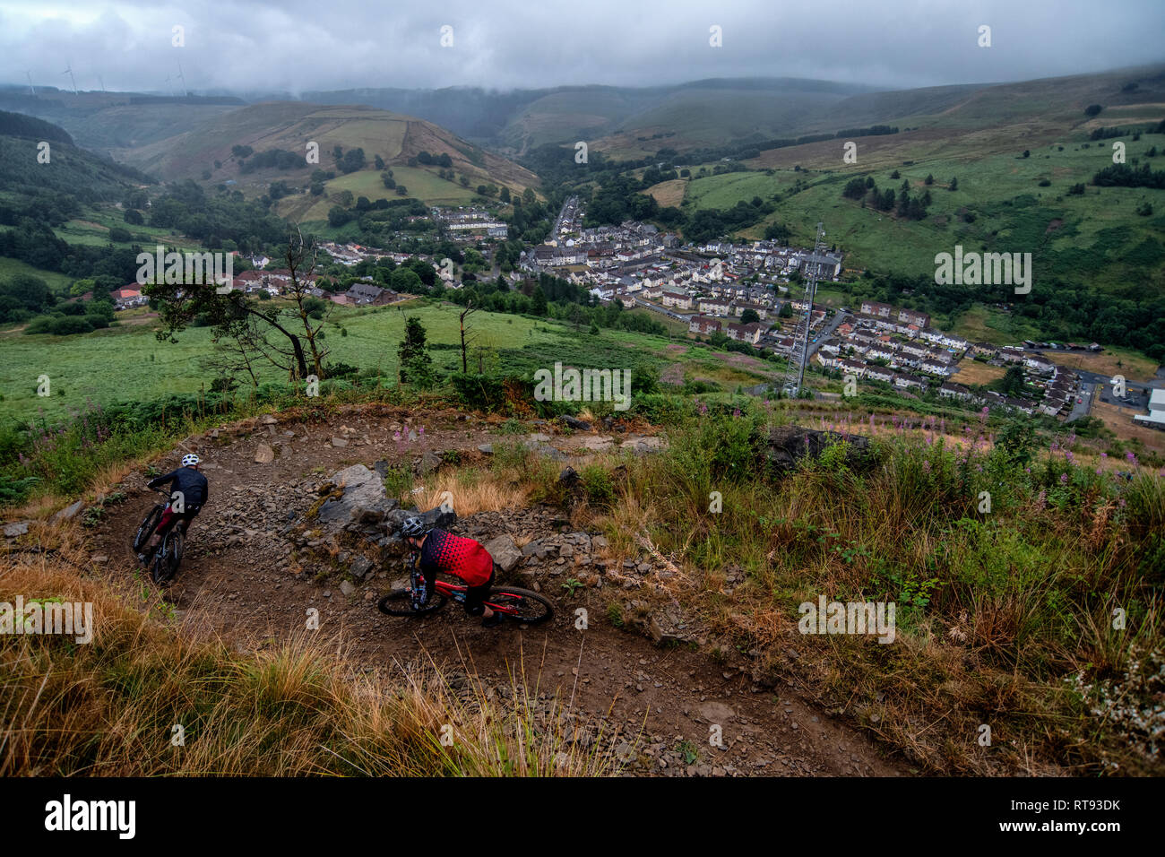 Two men ride mountain bikes on a trail at Glyncorrwg in Neath Port
