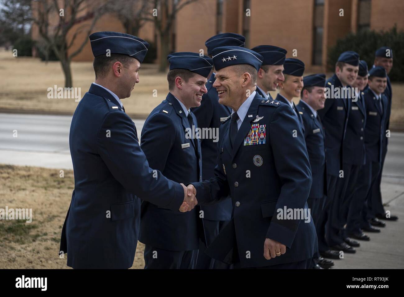 Lt. Gen. James C. Vechery, U.S. Africa command’s deputy for military operations, shakes hands with a student pilot Jan. 25, at the graduation ceremony held at Vance Air Force Base, Oklahoma. Vechery was the guest speaker for Undergraduate Pilot Training Class 19-05’s graduation ceremony. Stock Photo