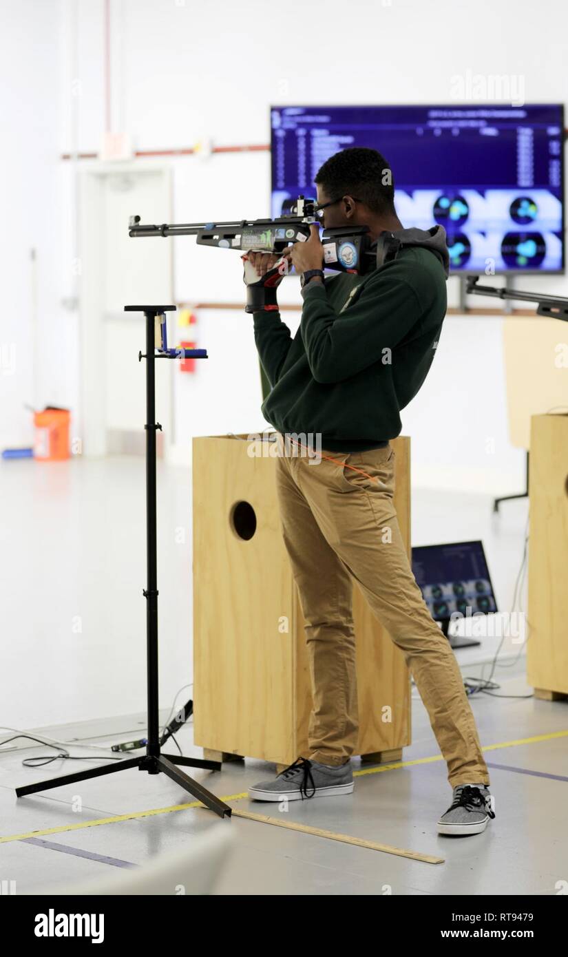 Deonte Hayes, a competitor with Nation Ford A from Fort Mill, South Carolina, fires during the Day 1 Sporter Finals of the U.S. Army Junior Rifle National Championships at Fort Benning, Georgia January 25, 2019. The three-day, invitation-only event had the youth athletes compete side by side for top individual and team honors in three-position smallbore, sporter rifle and precision rifle. Stock Photo