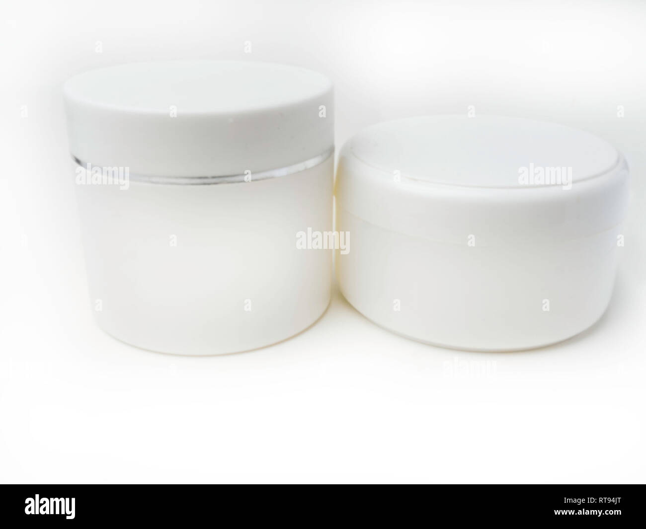 two Cosmetic Packages Container For Cream, Medicine or Gel On Isolated ...