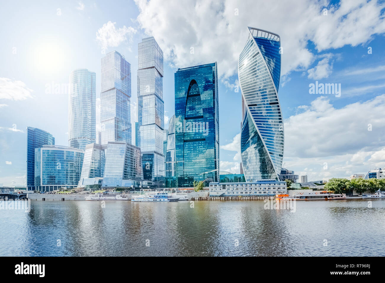 Skyscrapers of modern architecture in Moscow on the river bank under a blue  sky with clouds Stock Photo - Alamy