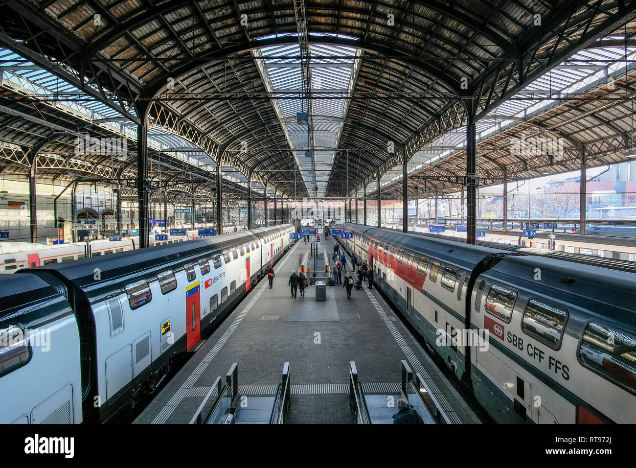 Platform of Europe's largest border station, Basel SBB station, with waiting trains of the Swiss Federal Railways SBB. Stock Photo