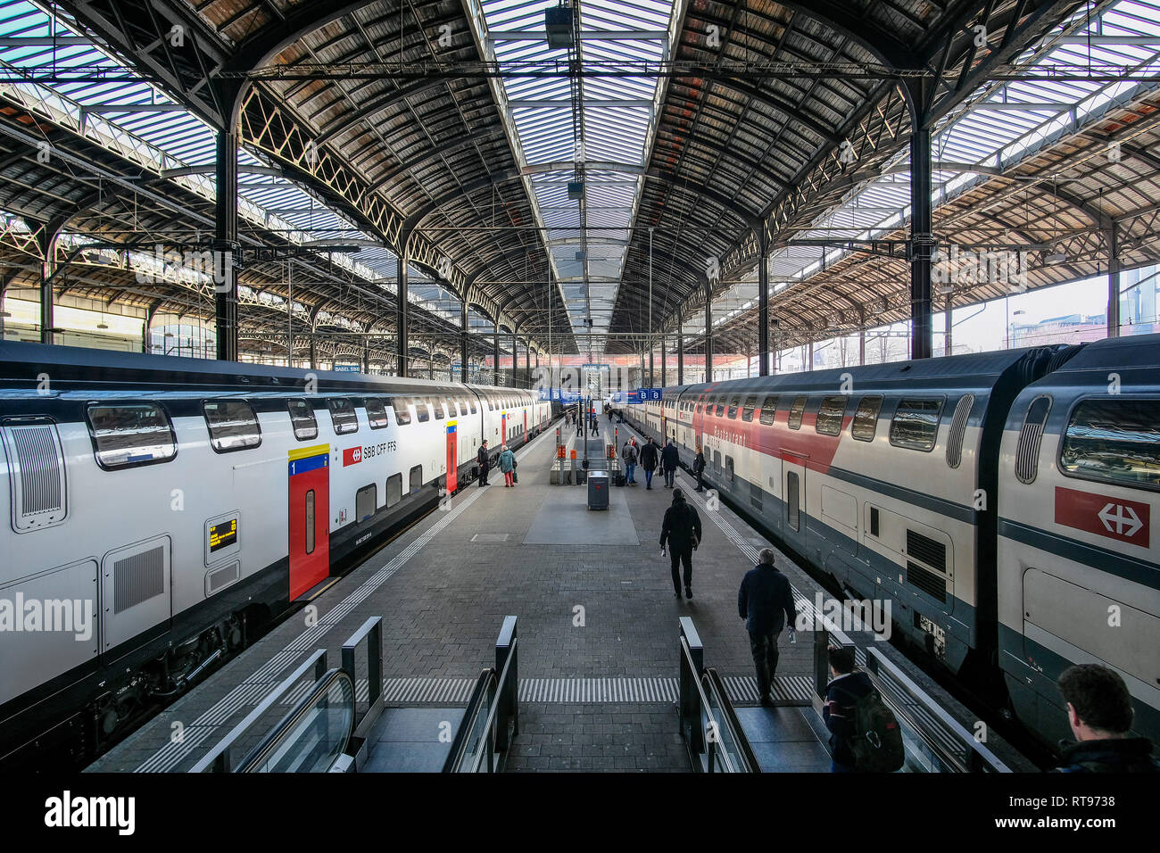Platform of Europe's largest border station, Basel SBB station, with waiting trains of the Swiss Federal Railways SBB. Stock Photo