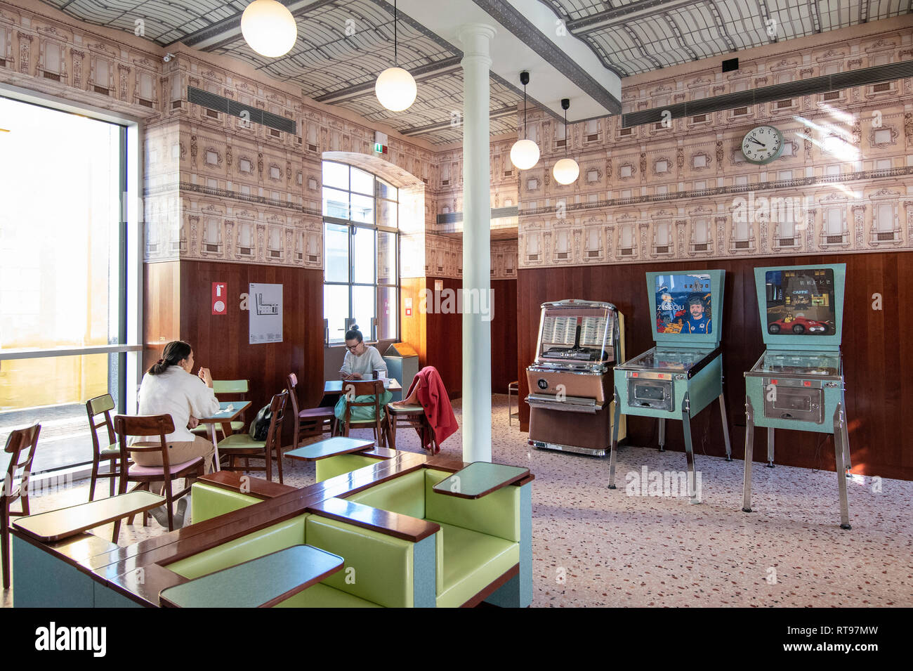 Retro-looking interiors and formica pastel furniture at Bar Luce, Wes Anderson-inspired bar and cafe in the Fondazione Prada district of Milan, Italy Stock Photo