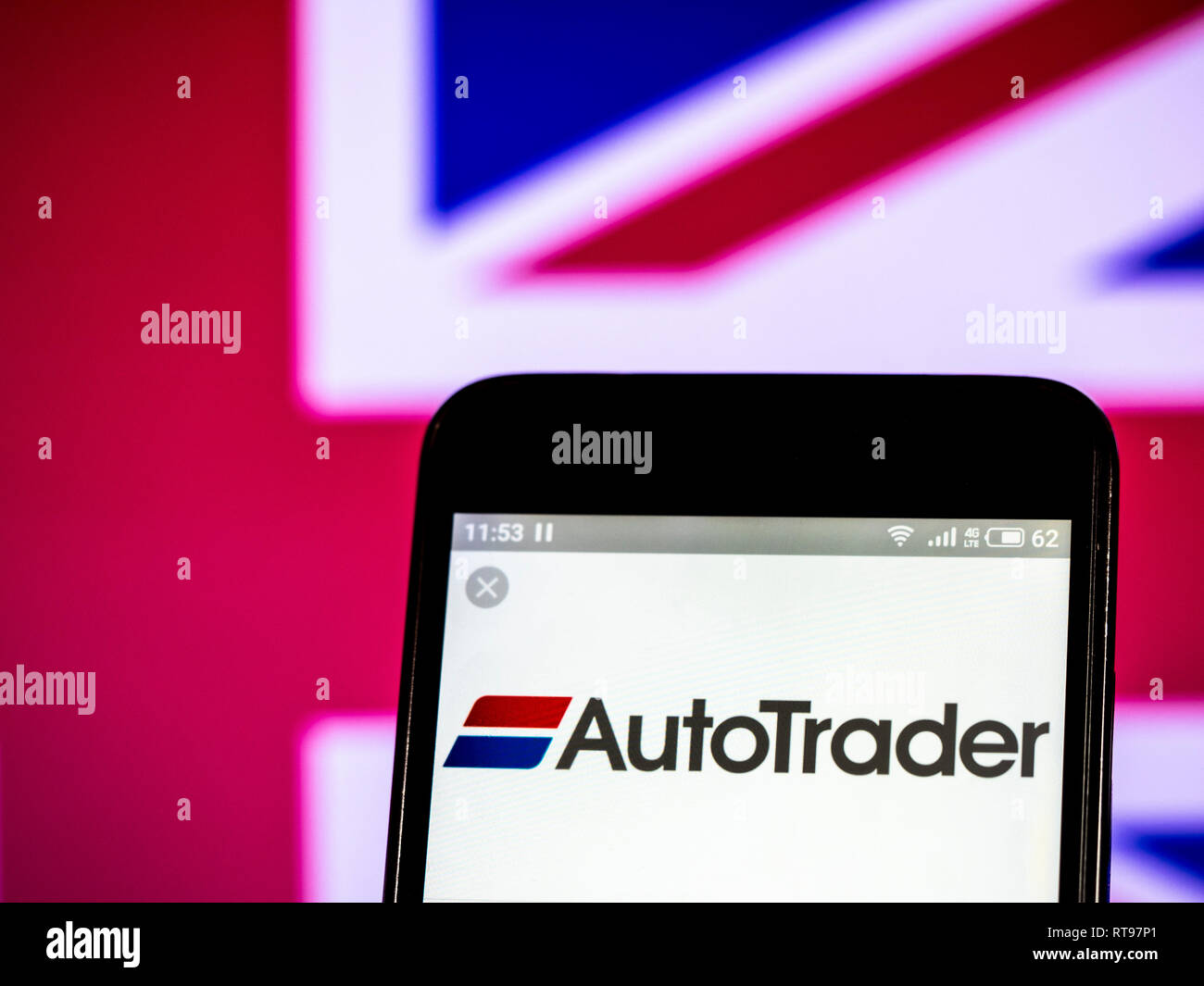 Auto Trader Group plc logo seen displayed on smart phone Stock Photo
