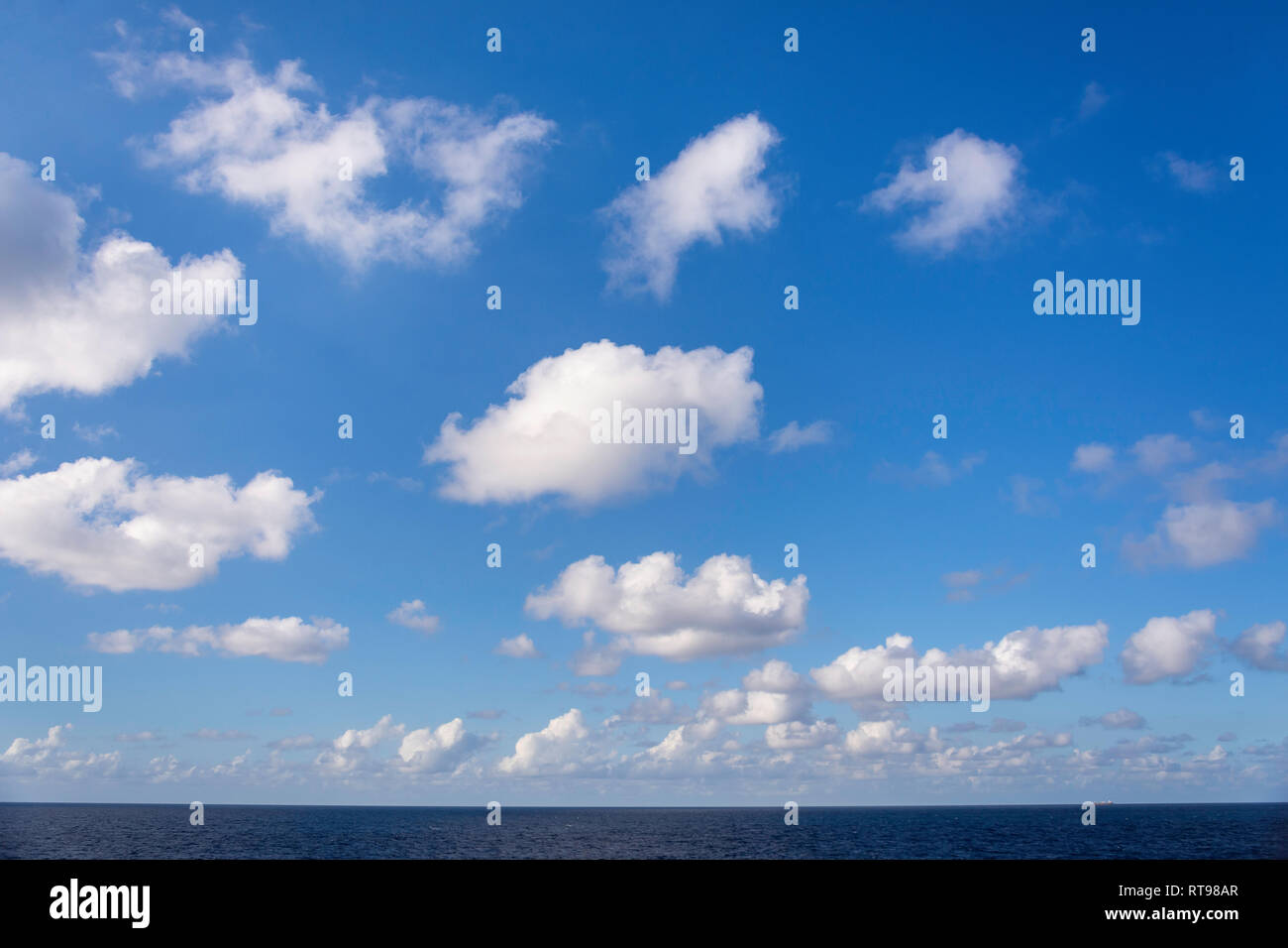 View of sea, sky and clouds from deck of P&O Britannia cruise ship, Leeward Antilles, Caribbean Sea Stock Photo