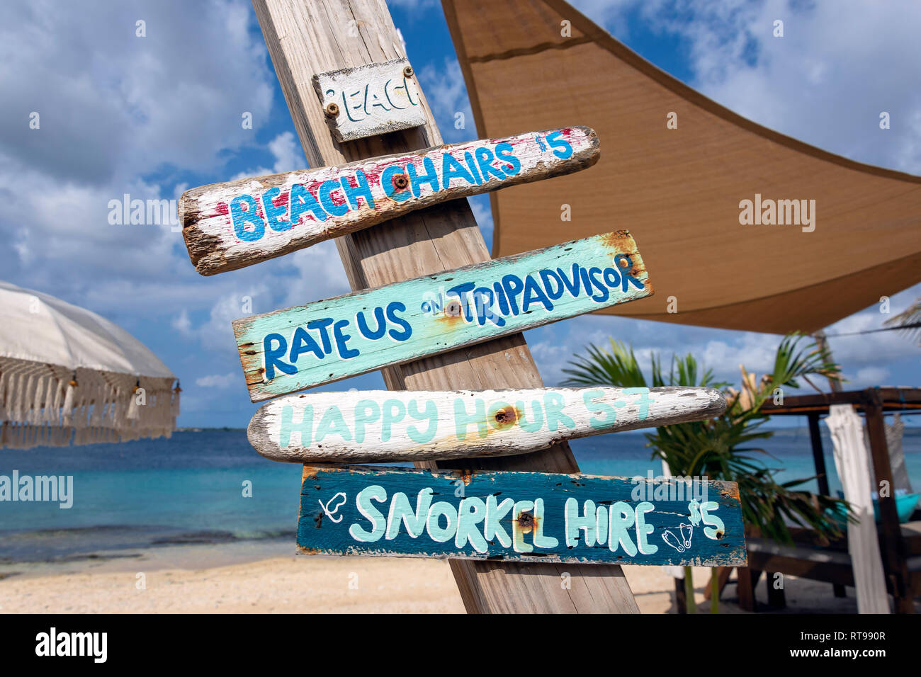 Driftwood signs on Coco Beach Bonaire, Kralendijk, Bonaire, ABC Islands, Leeward Antilles, Caribbean Stock Photo