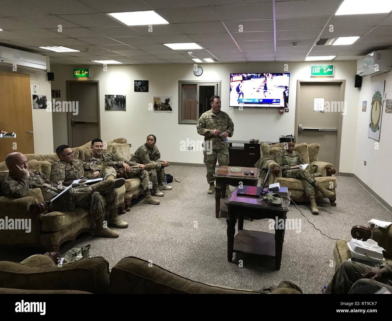 Lt. Col. Leopold Karanikolas, 420th Transportation Battalion commander, conducts an officer professional development (OPD) session to all of his officers in the battalion at Camp Arifjan, Kuwait, Jan. 26, 2019.  The purpose of the OPD is to continue to develop the leaders in the battalion. Stock Photo