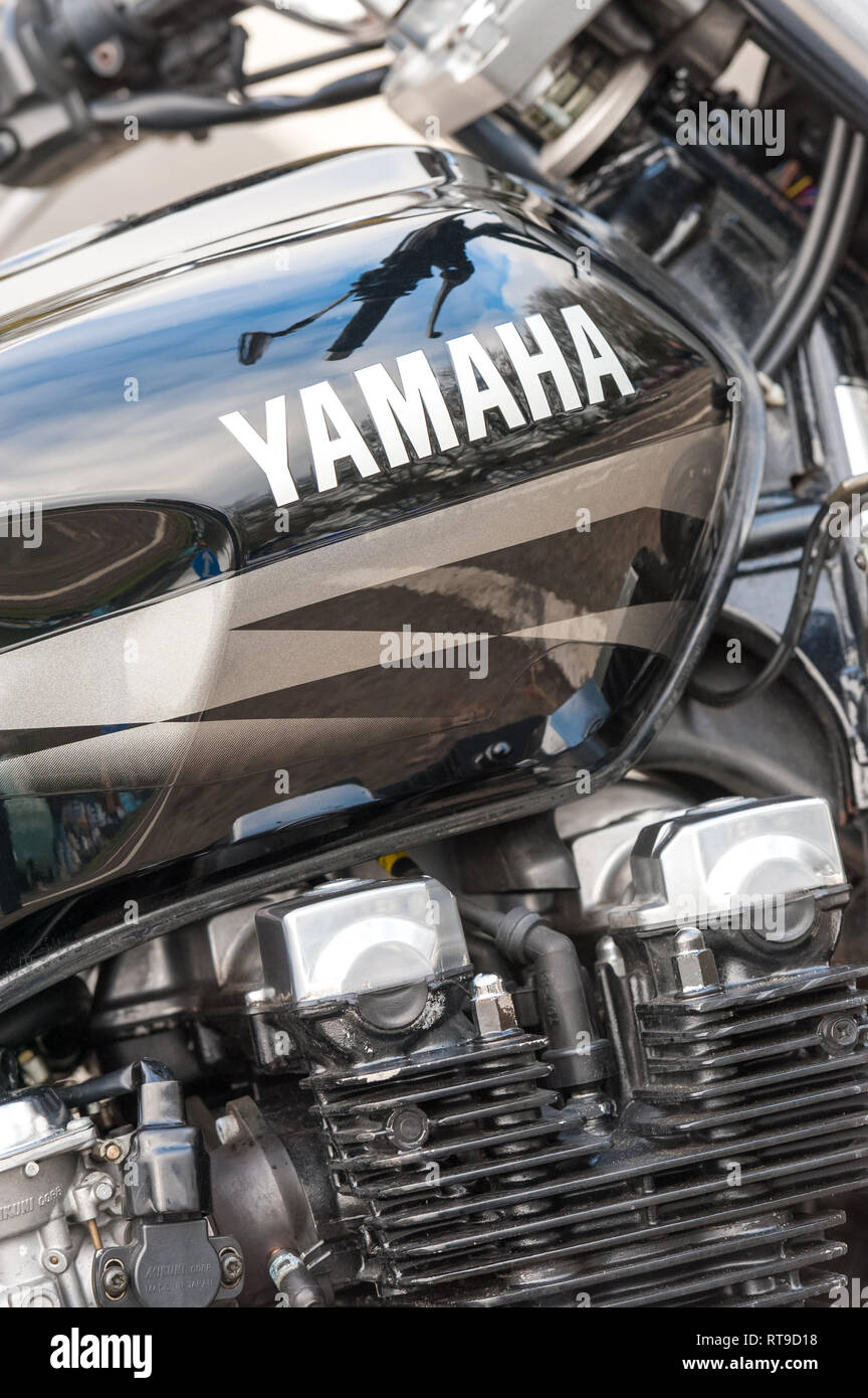 Hook, UK - January 1, 2019: Close-up of the engine and fuel tank of a classic Yamaha motorcycle in Hook, UK Stock Photo