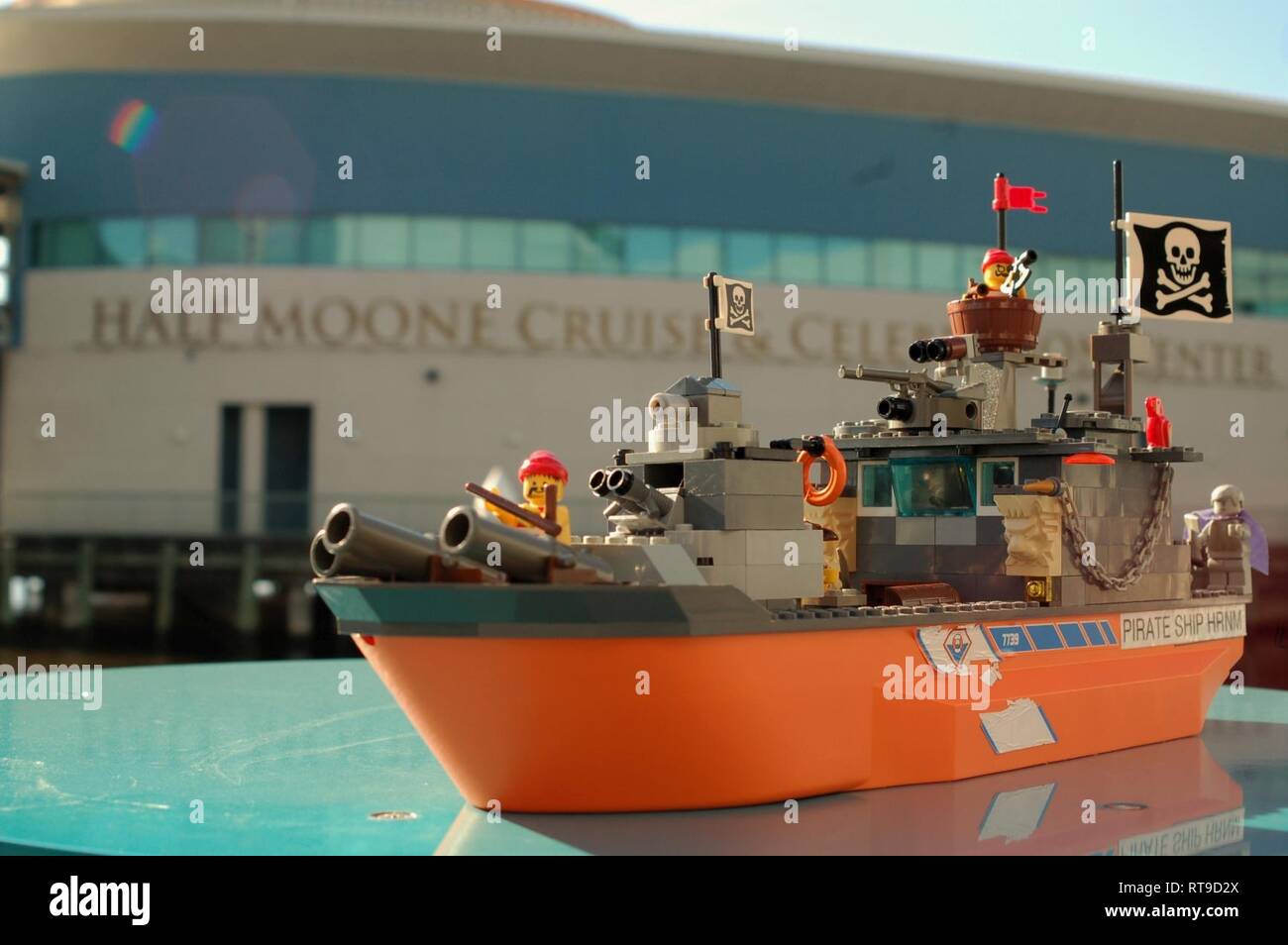 A LEGO pirate ship and associated LEGO mini-figures cleverly posed in-front  of the Decker Half Moone Cruise Terminal. Both decks of the cruise terminal  will be used for the 8th Annual LEGO