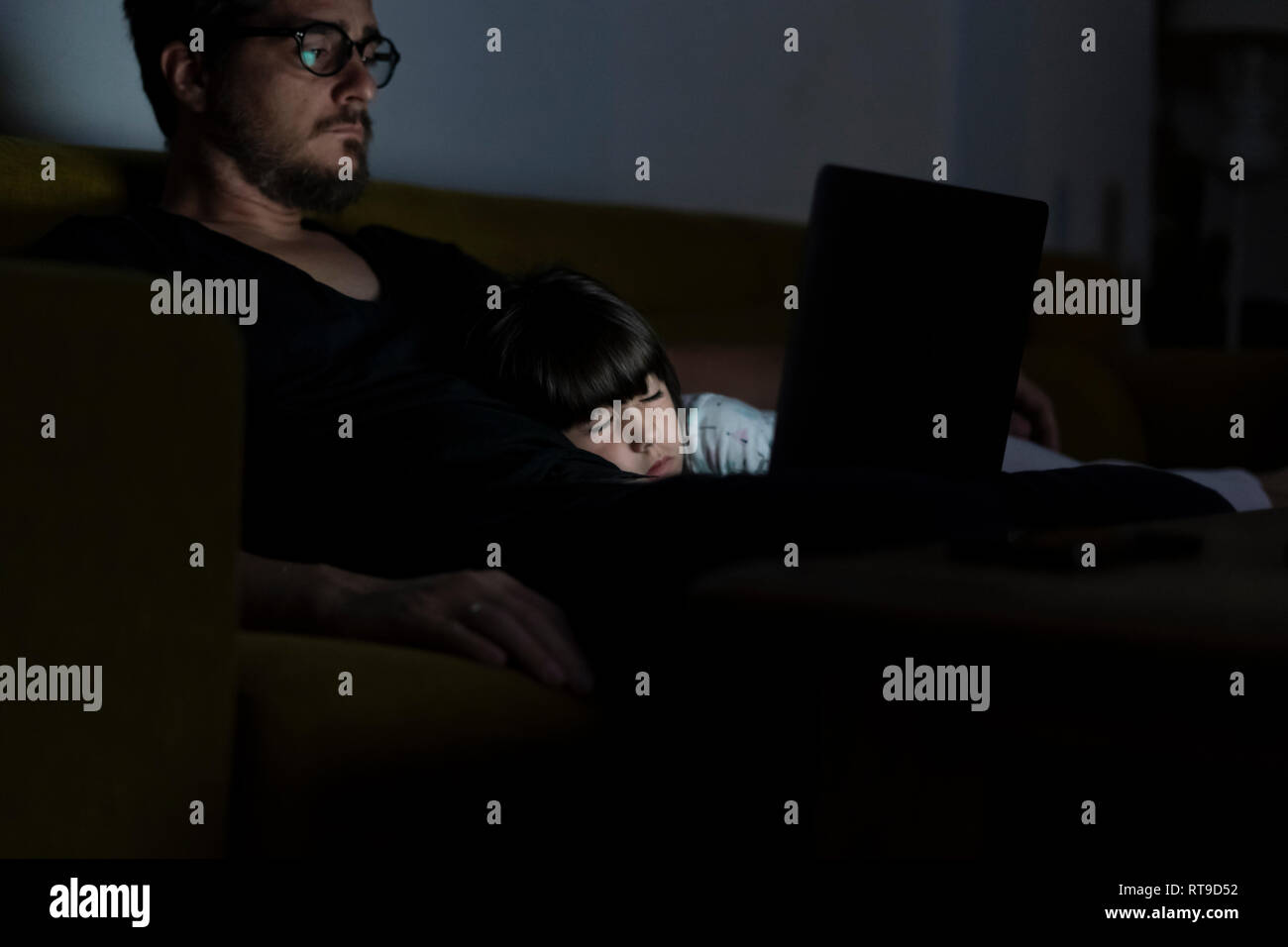 On sofa working as night hires stock photography and images Alamy