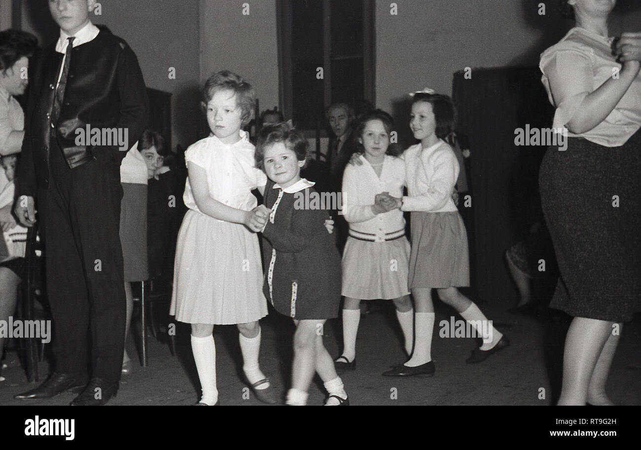 1950s, historical, young children dancing together at a wedding reception in a church hall, England, UK. Stock Photo