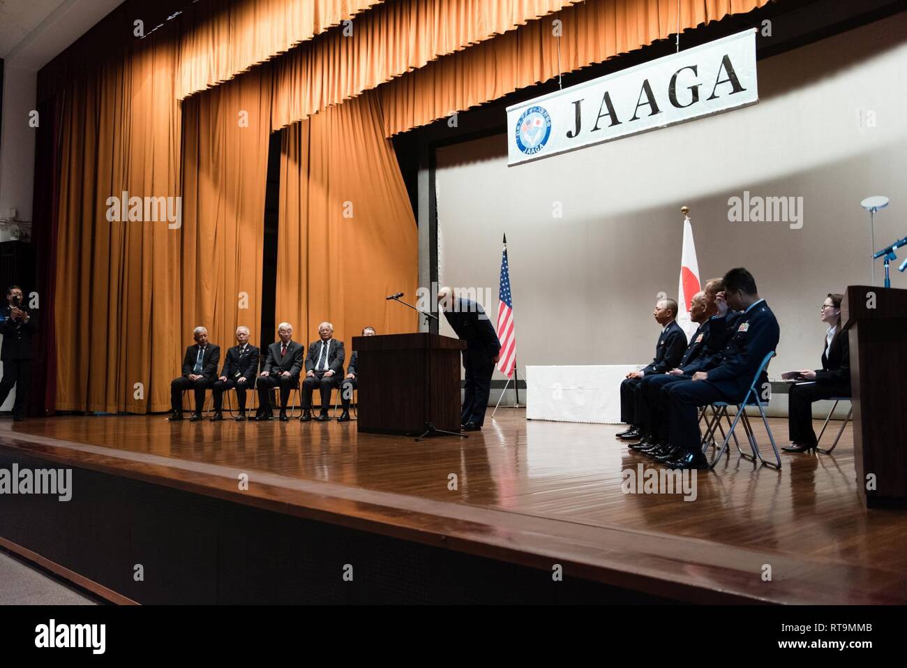 U.S. Air Force 1st Lt. Antoinio Arnold, 18th Operation Support Squadron chief of intel readiness, bows after delivering a speech in Japanese during the 2018 JAAGA Awards Ceremony January 31, 2019, at Naha Air Base, Japan. Arnold was recognized for his outstanding skills in a Japan-U.S. defense conference, the Bilateral Leadership Officer Group and the Koku-Jieitai English Competition. Stock Photo