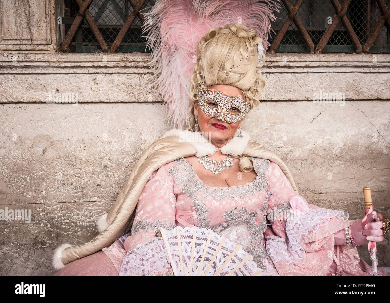 A masked woman at the carnival in venice hi-res stock photography and ...