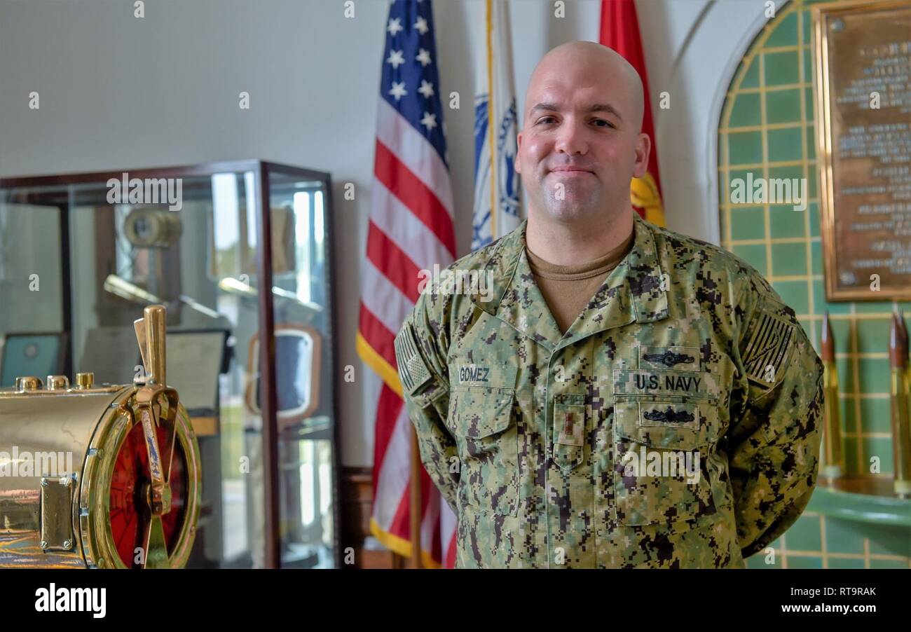 PENSACOLA, Fla. (Feb. 1, 2018) Chief Warrant Officer 2 Ernesto Gomez, assigned to the Center for Information Warfare Training (CIWT), poses for an informal portrait immediately after his commissioning ceremony. Gomez was commissioned as a chief warrant officer on CIWT’s quarterdeck onboard Naval Air Station Pensacola Corry Station, Pensacola, Florida. Stock Photo