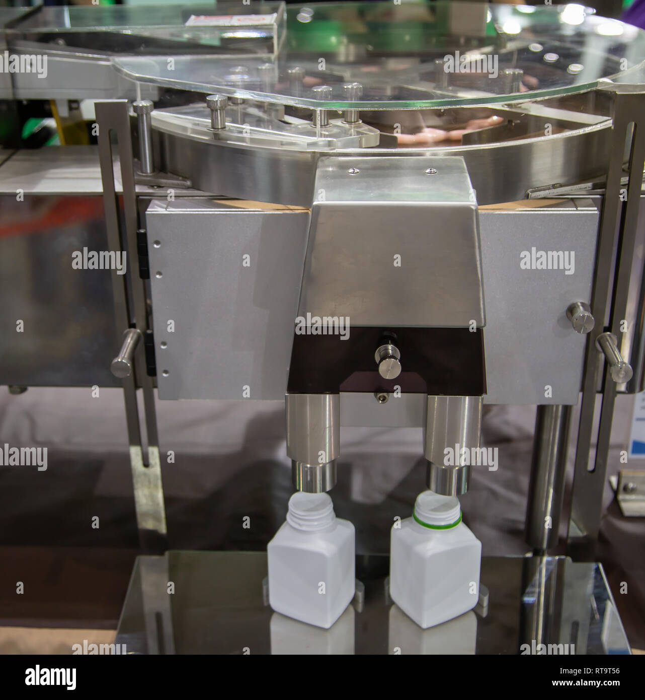 capsule pharmaceutical pills counting and filling machine Stock Photo