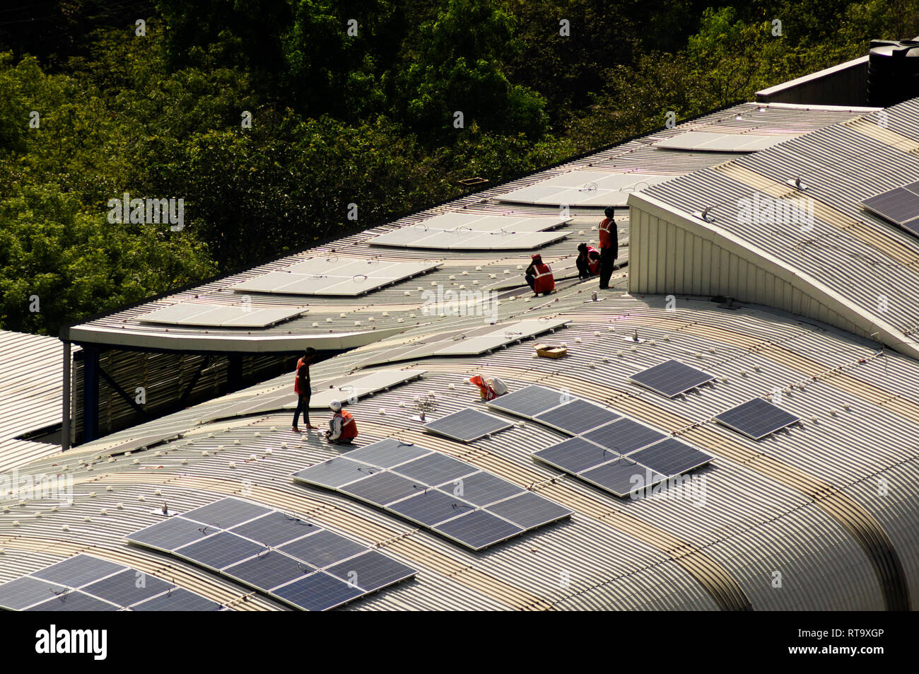 Solar panels being installed on the roof of delhi metro station Stock ...