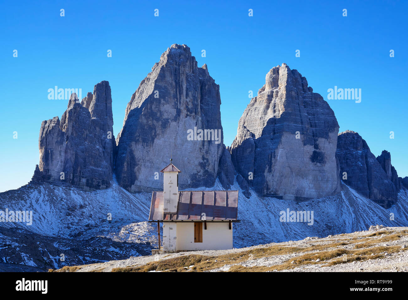 The north face of Tre Cime di Lavaredo and the chapel on Forcella Lavaredo,  Misurina, Dolomites, Veneto, Italy Stock Photo - Alamy