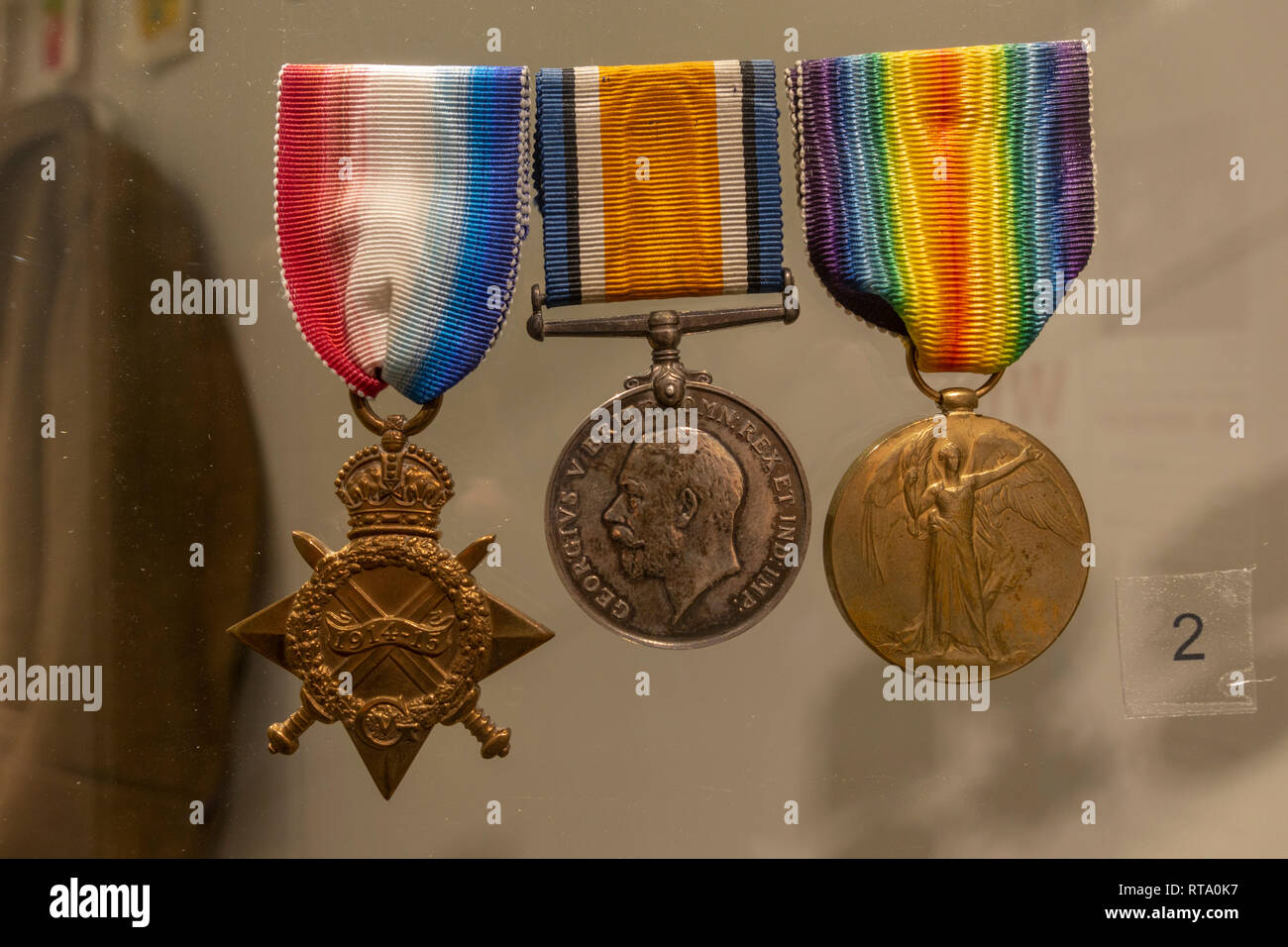 1914–15 Star,  British War Medal, Victory Medal (also called the Inter-Allied Victory Medal) on display, York Castle Museum, York, Yorkshire, UK. Stock Photo