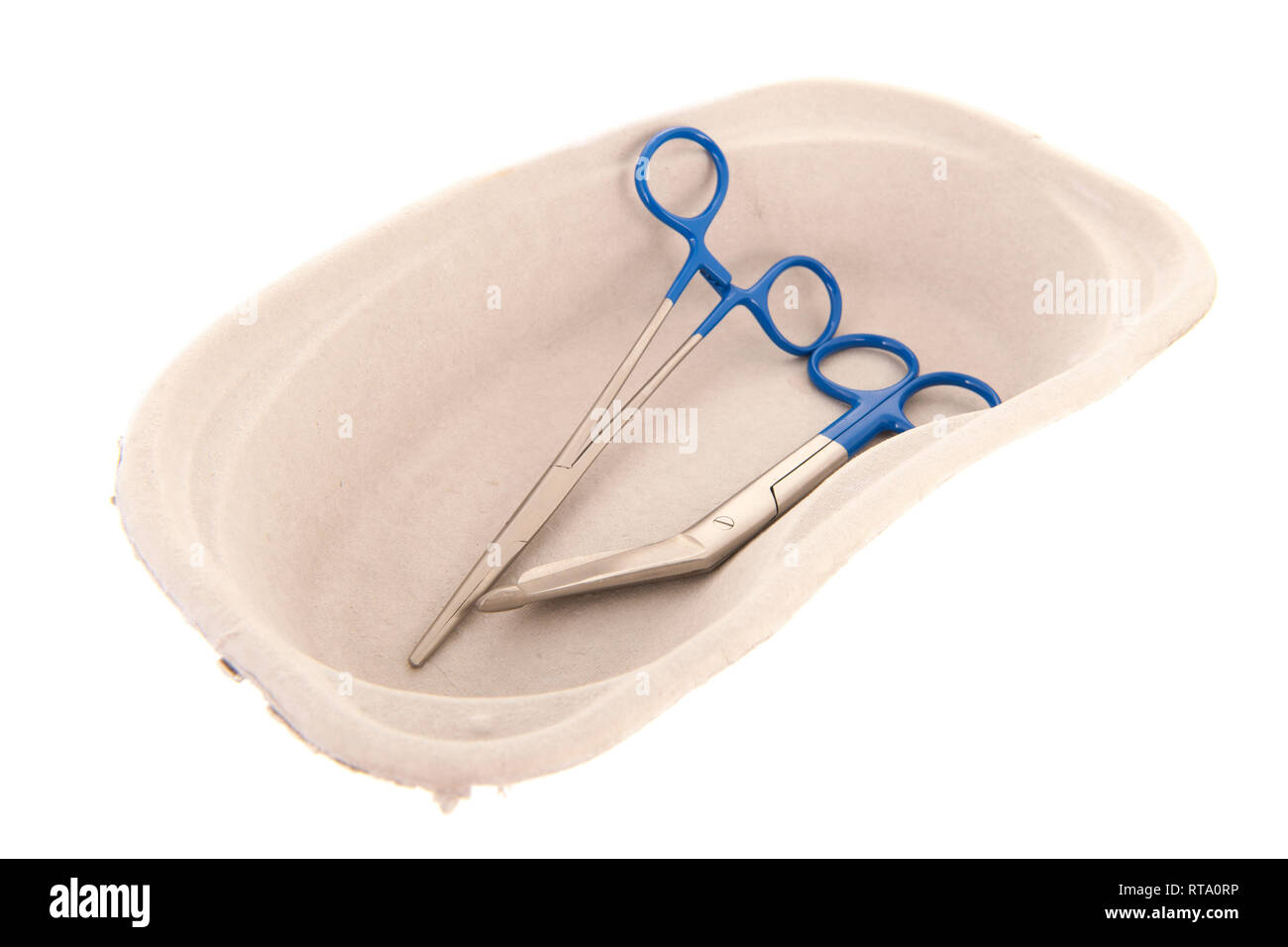 Medical scissors in renal pelvis carton box isolated over white background Stock Photo