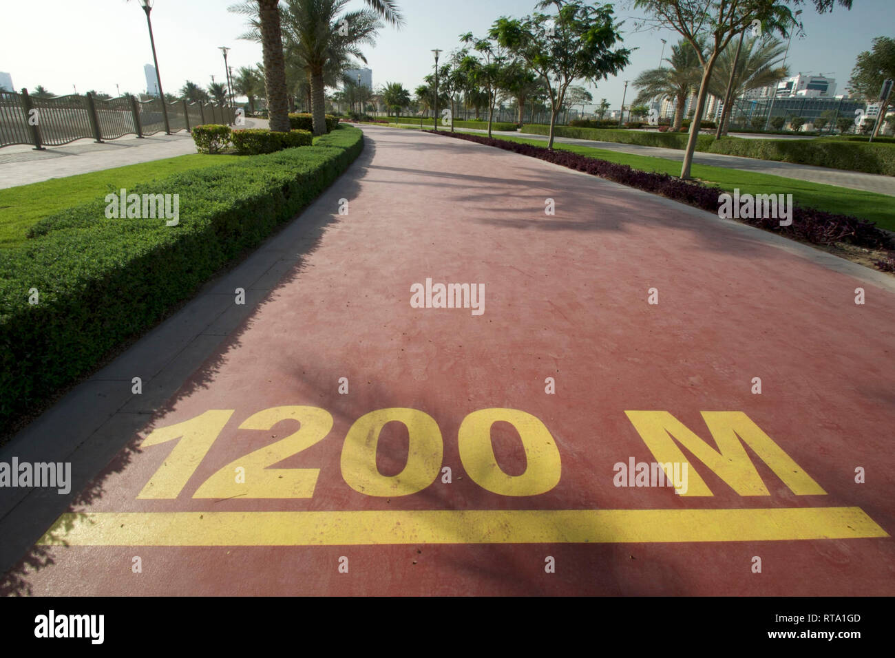 Dubai-Al Barsha Pond Park running track mark 1200 M wide Stock Photo