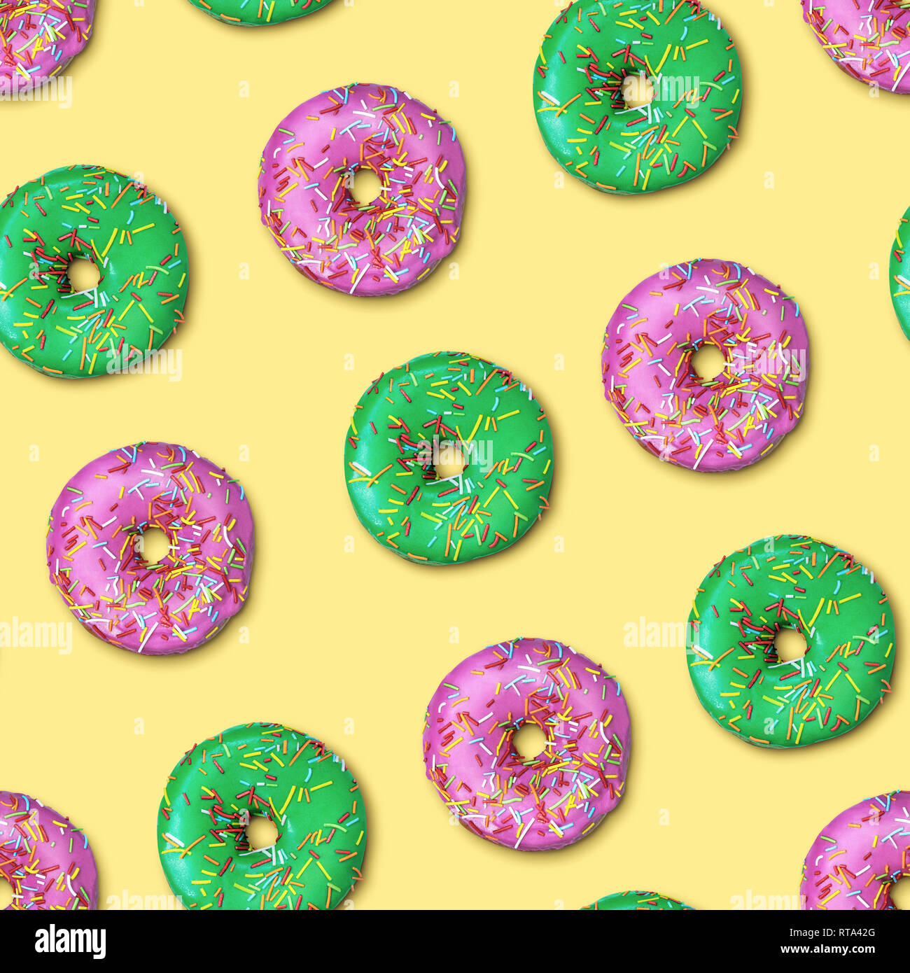 Bright flat seamless pattern with donuts. Pink and green glazed donuts ...