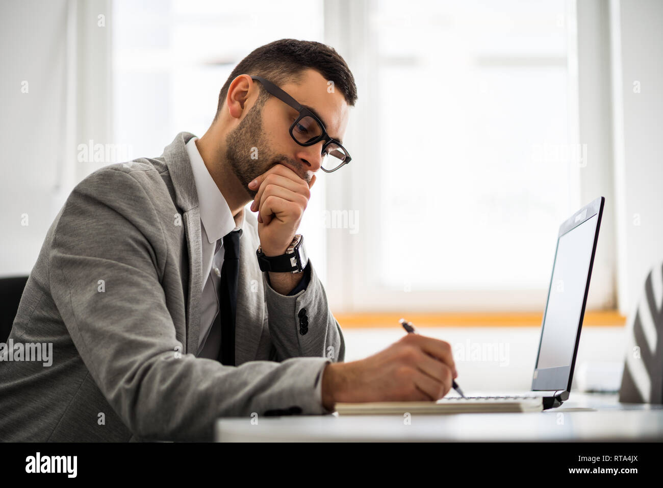 Young businessman is working in office. Stock Photo