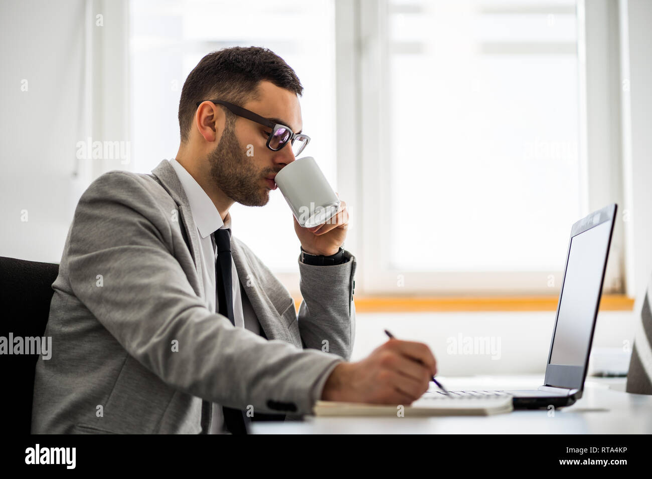 Young businessman is working in office. Stock Photo