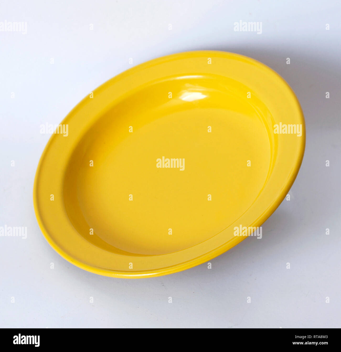 Vintage yellow enameled metal plate Stock Photo Alamy