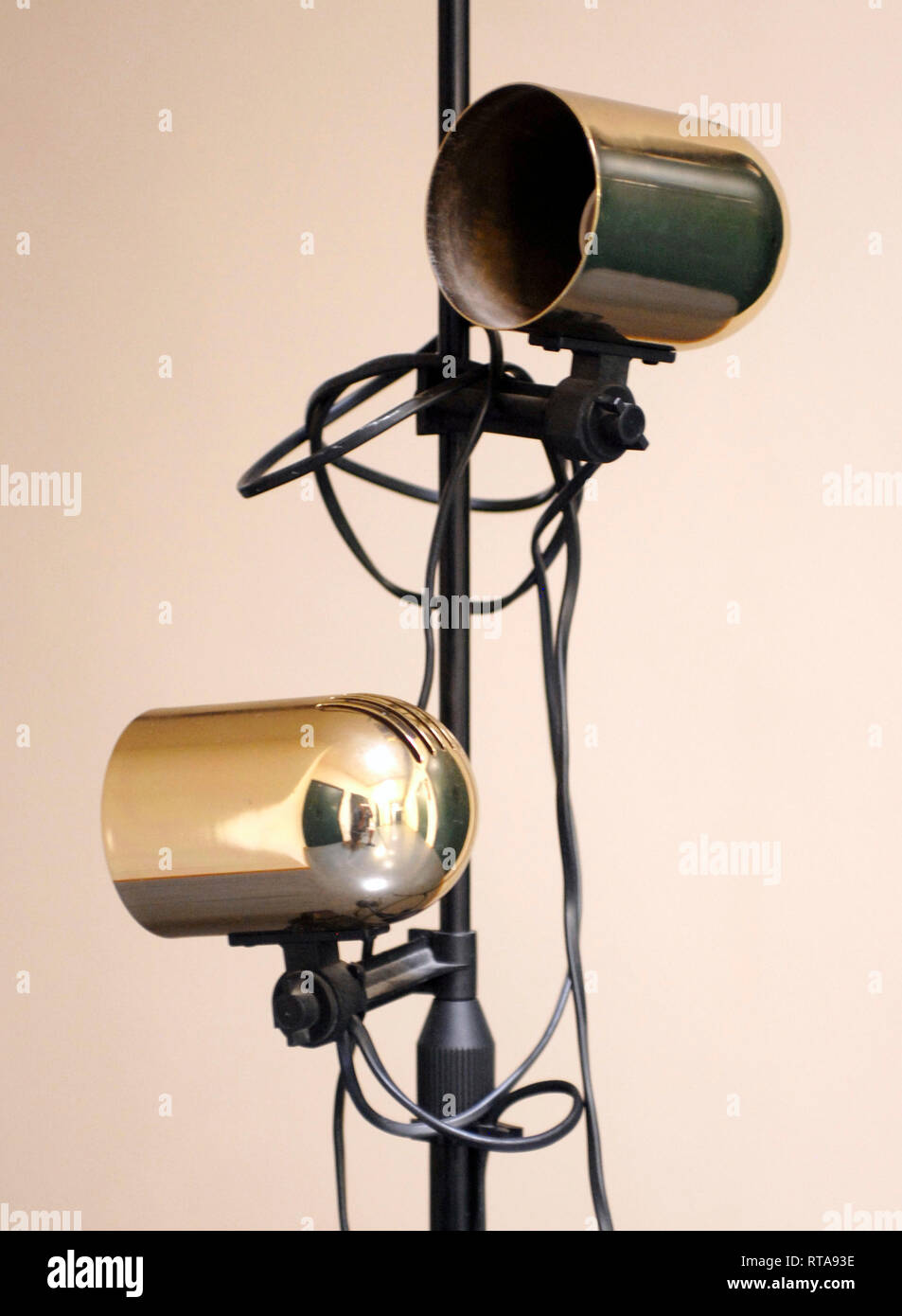 Vintage floor lamp with gold spotlights, FASE brand Stock Photo Alamy