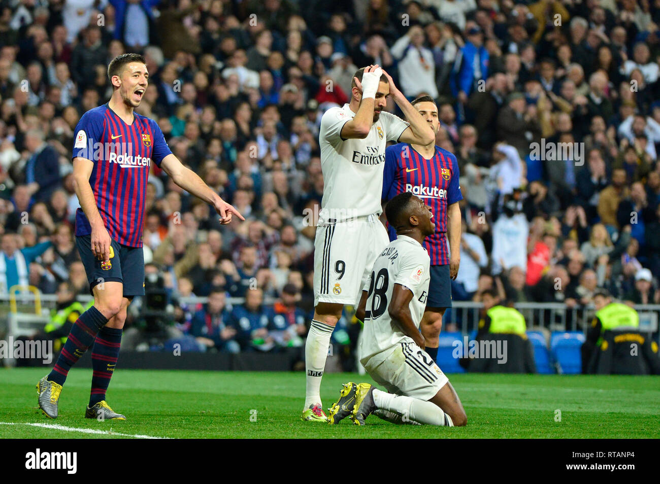 Madrid, Spain. February 27, 2019 - Vinicius Jr. and Benzema after the brazilian wasted a goal chance. Barcelona stroll into Copa del Rey final with 3- Stock Photo