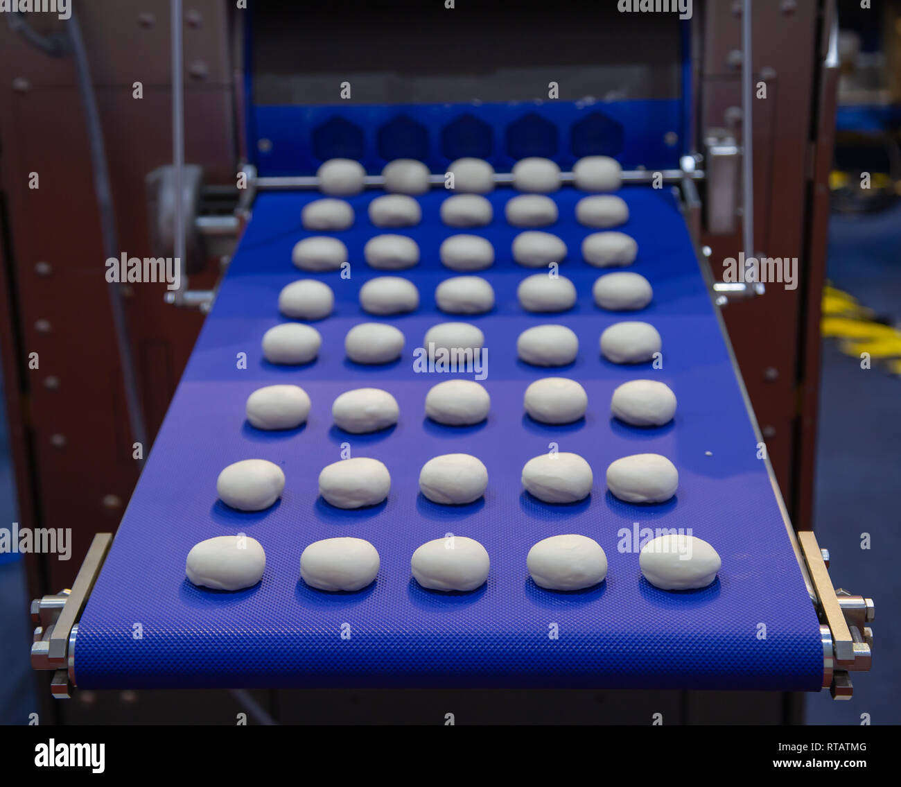 Dough divider and rounder dough ball making machine Stock Photo Alamy