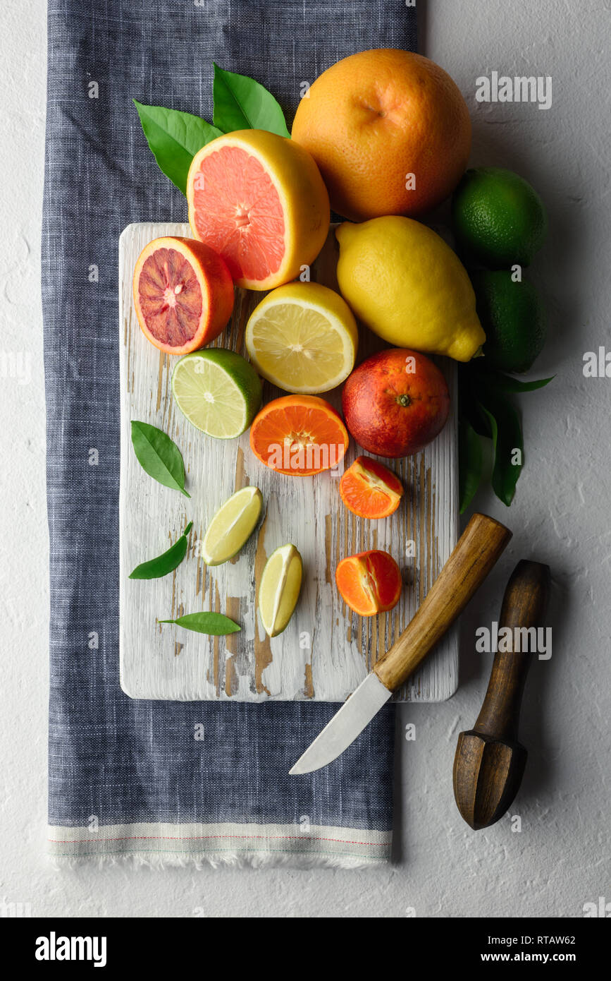 Mix of different citrus fruits closeup. Healthy diet vitamin concept. Food photography Stock Photo