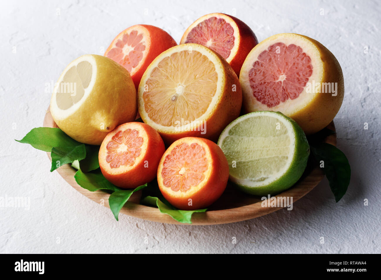 Mix of different citrus fruits closeup. Healthy diet vitamin concept. Food photography Stock Photo
