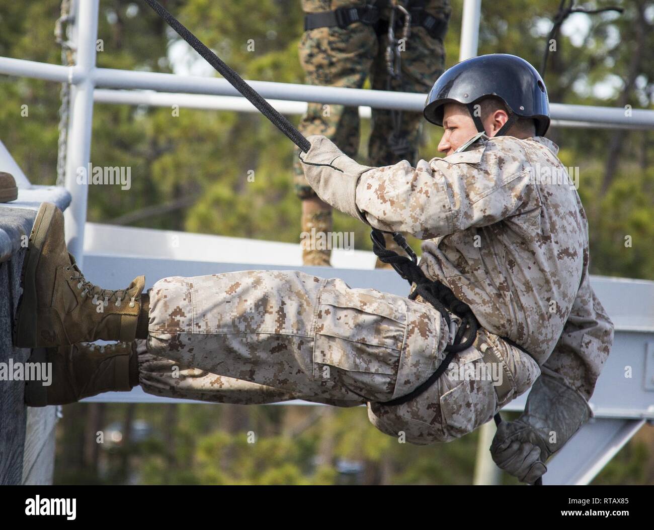 Recruits with Fox Company, 2nd Recruit Training Battalion, rappel down ...