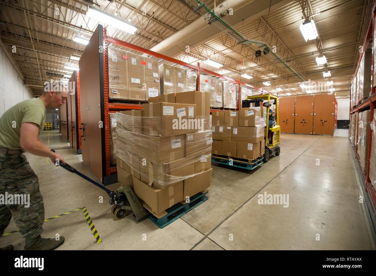 https://c8.alamy.com/comp/RTAYAX/us-air-force-basic-military-training-trainee-and-maricel-gomez-502d-logistics-readiness-squadron-material-handler-unload-basic-military-training-supplies-in-preparation-for-initial-and-secondary-clothing-issue-feb-4-2019-at-joint-base-san-antonio-lackland-texas-the-502d-lrs-is-responsible-for-issuing-and-fitting-individual-uniforms-for-over-1600-bmt-trainees-weekly-RTAYAX.jpg