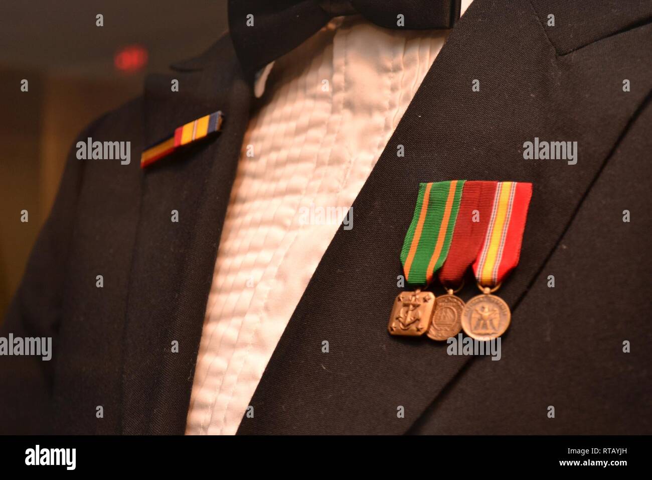 Accession #2019-001. Uniform, Master Chief Petty Officer. The dress mess blue  uniform belonging to Master Chief Petty Officer Stan White is on display in  the Cold War gallery of the Hampton Roads
