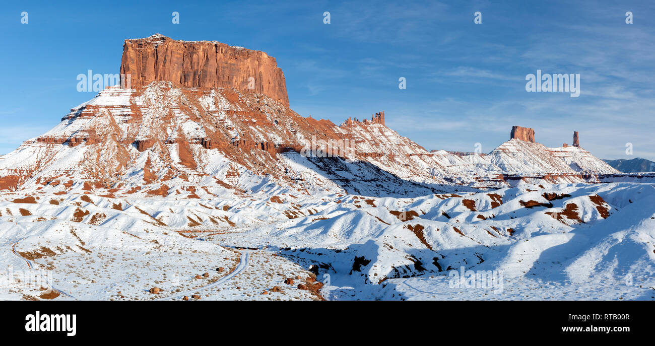 A Panoramic image of the mesas and towers in Castle Valley on a snowy day near Moab, Utah. Stock Photo