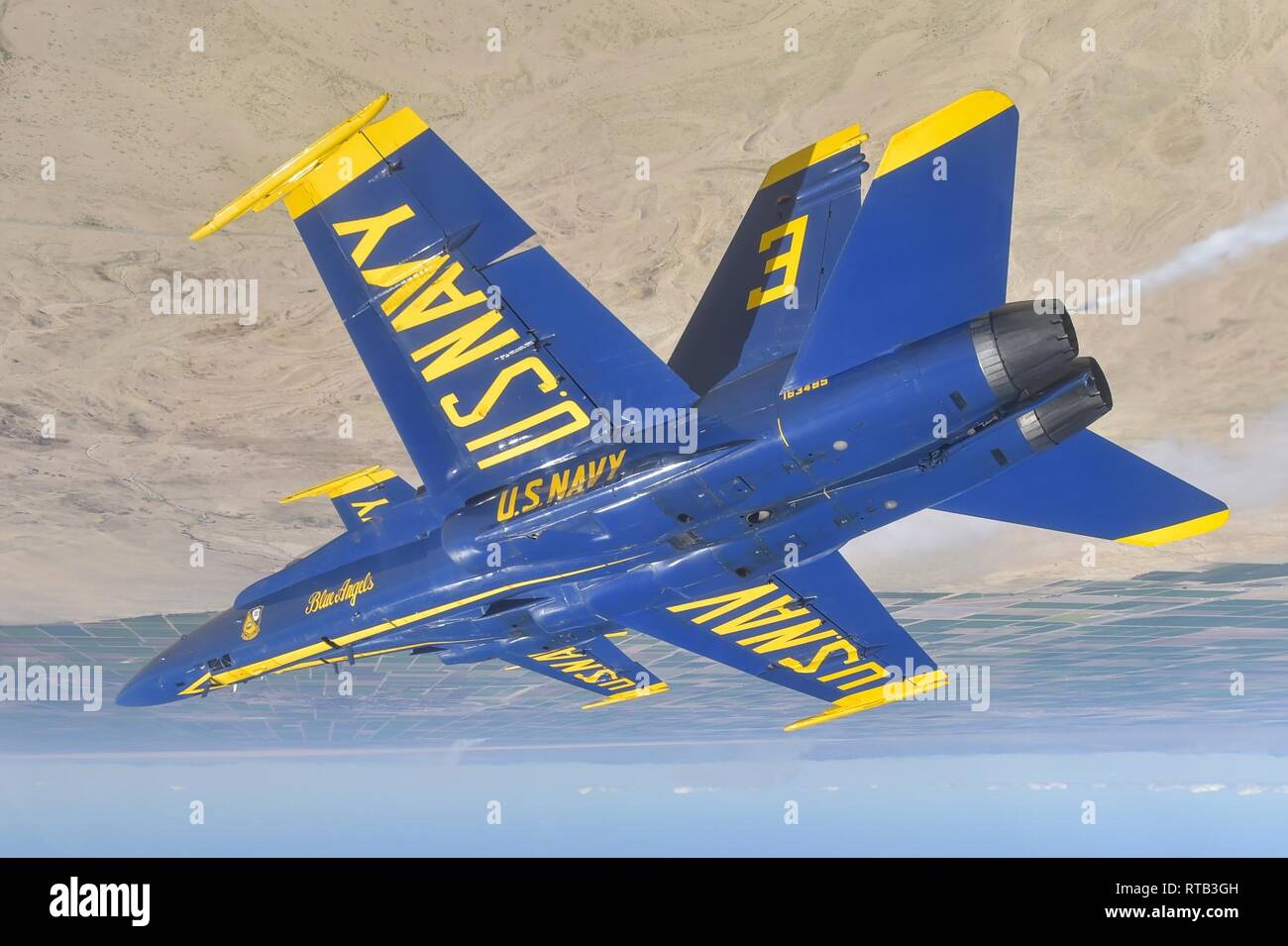 EL CENTRO, Calif. (Feb. 6, 2019) The U.S. Navy Flight Demonstration Squadron, the Blue Angels, diamond pilots perform the diamond 360 maneuver over the Imperial Valley during a training flight. The Blue Angels are conducting winter training at Naval Air Facility El Centro, California, in preparation for the 2019 show season. The team is scheduled to conduct 61 flight demonstrations at 32 locations across the country to showcase the pride and professionalism of the U.S. Navy and Marine Corps to the American public. Stock Photo
