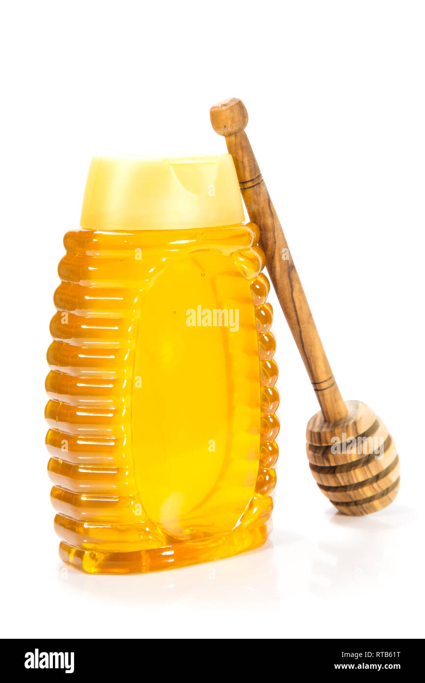 Honey bottle isolated on white background Stock Photo